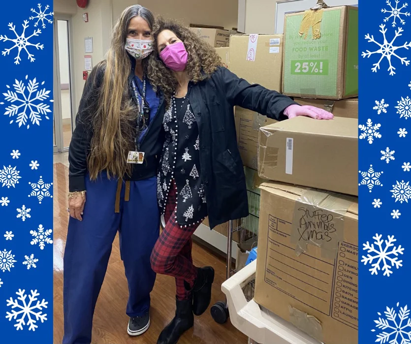 Marilyn Richardson with Brenda Holt and the boxes of toys she donated