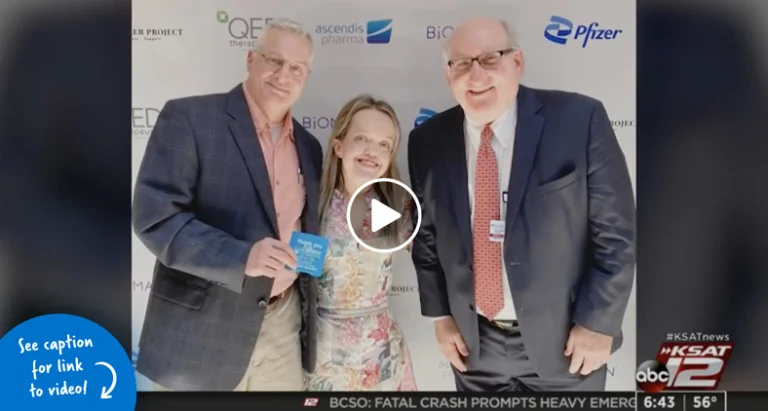 Young woman pictured between Dr. Shawn Standard and Dr. John Herzenberg at the Achondroplasia Research Conference