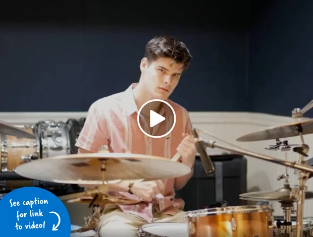 Young man playing the drums