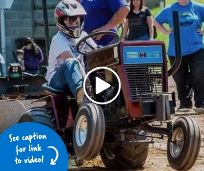 Jacob driving a tractor