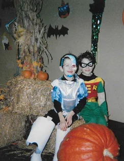 Christopher as a young boy in cyborg Halloween costume wearing ex fix cover with his twin