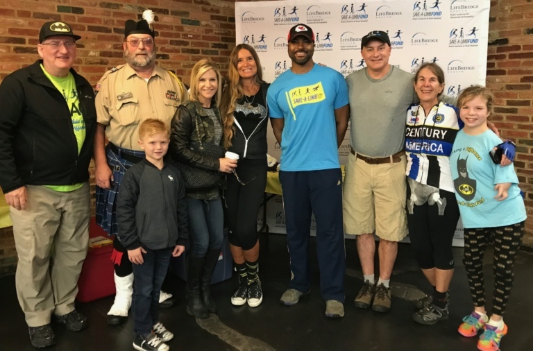 Dr. John Herzenberg, news anchor Jessica Kartalija, Pediatric Liaison Marilyn Richardson, Survivor: Fiji reality television winner and founder of Perthes Kids Foundation Earl Cole, and Dr. Shawn Standard pose with patients and volunteers at Rubin Institute for Advanced Orthopedics 2017 Save-A-Limb Fund Event