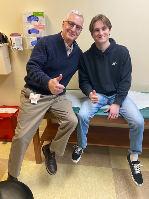 Josh and Dr. Standard at his final clinic appointment