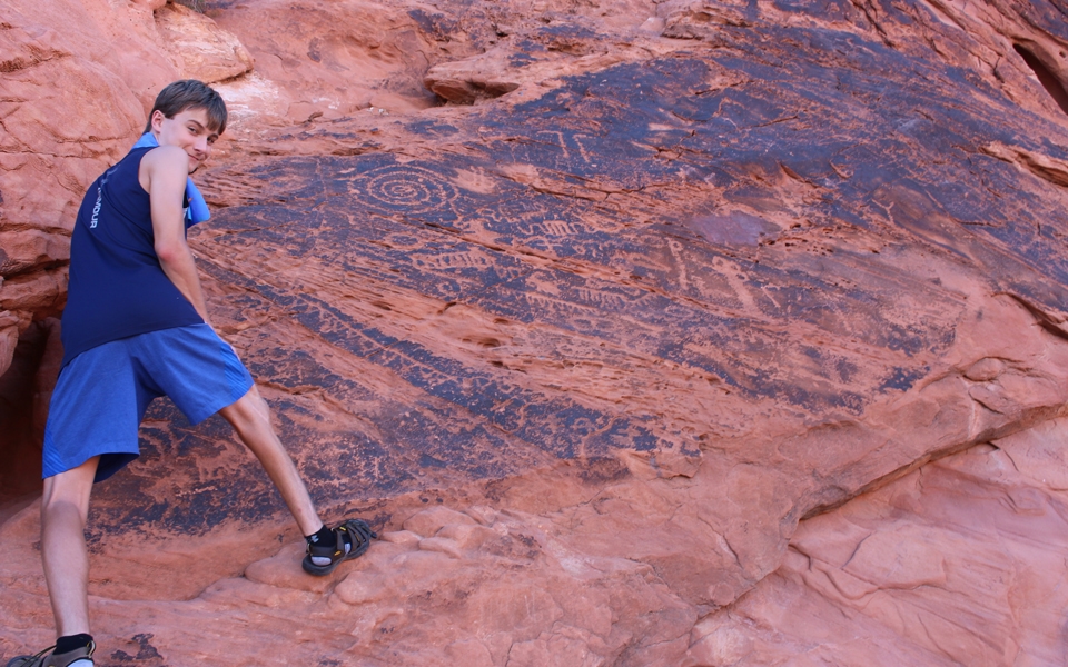 Josh as a boy rock climbing