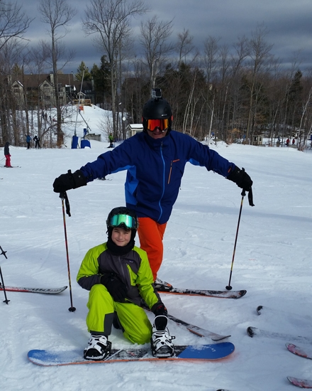 Josh as a boy snowboarding with his family